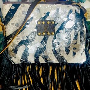 Keep It Gypsy Zebra upcycled hair on hide crossbody .